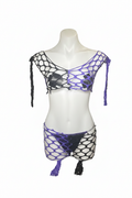 Purple and black two-tone fishnet stage set on mannequin – white background